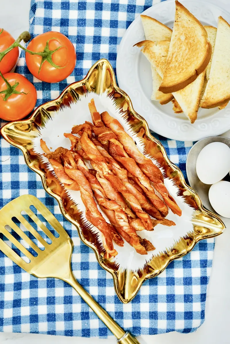 Beautifully plated bacon twists with breakfast accompaniments