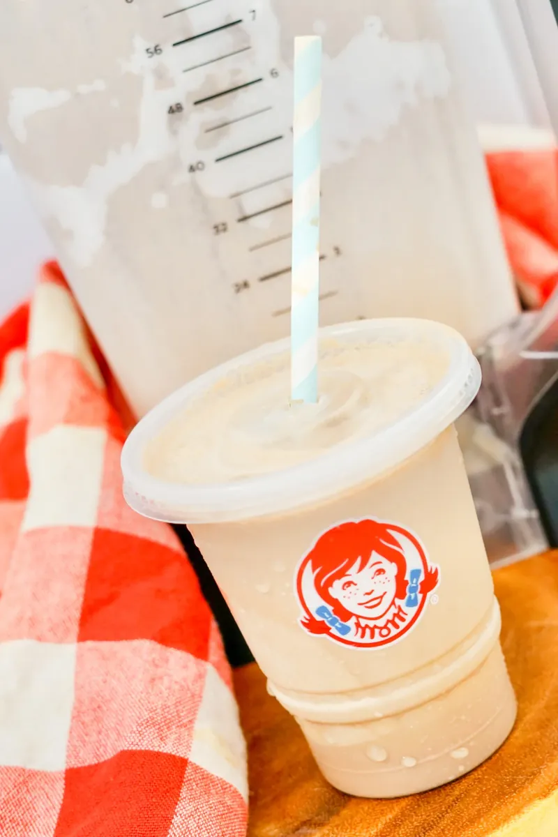 Copycat Wendy's Frosty served in authentic Wendy's cup with straw