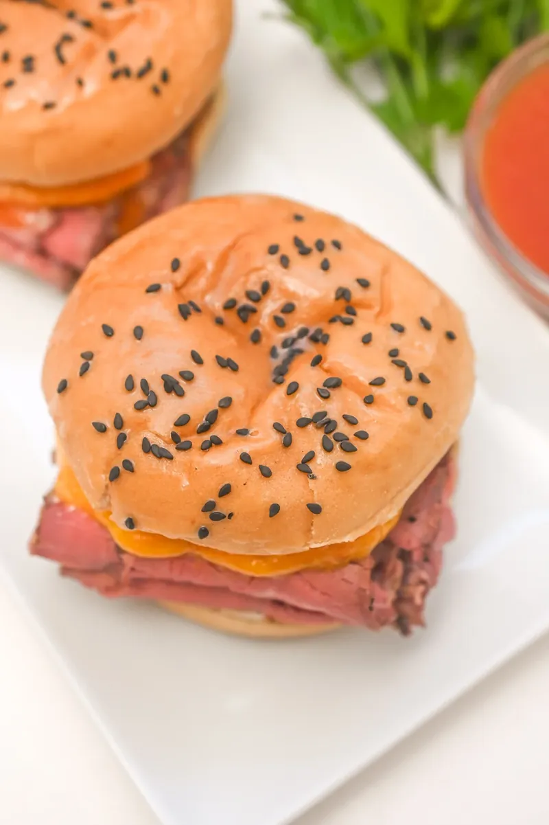 Keto Arby's copycat sandwich served on white square plate