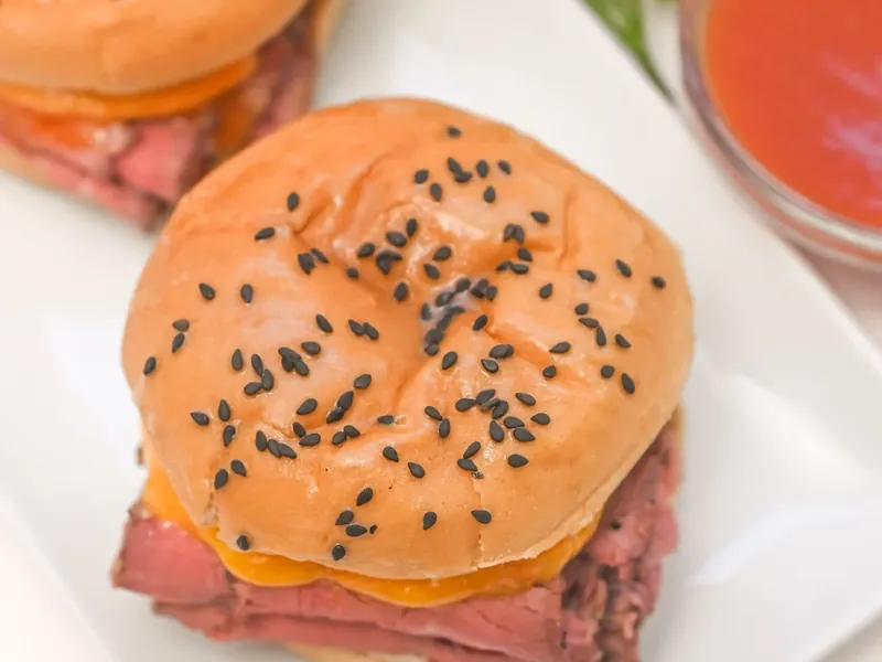 Completed keto Arby's sandwich with sesame seeds on top