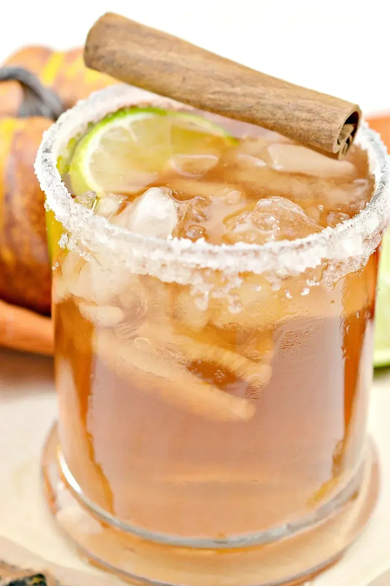 Beautifully presented keto thanksgiving margarita with autumn themed background
