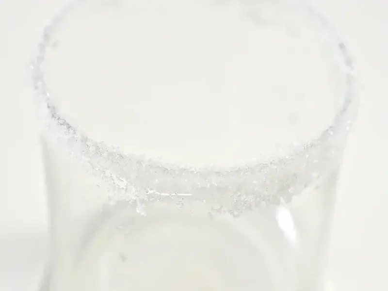 Glass with salted rim prepared for keto thanksgiving margarita
