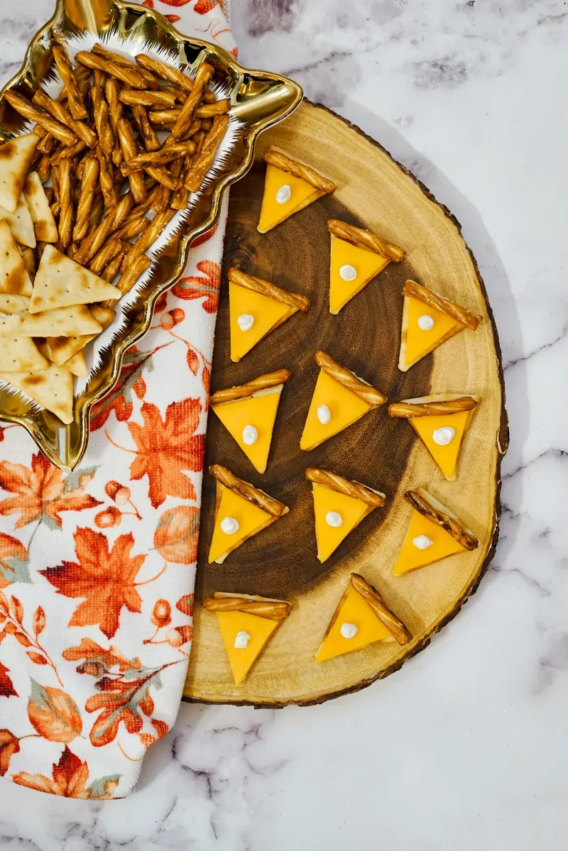 Overhead view of pie cheese crackers showing pretzel crust and cream cheese details