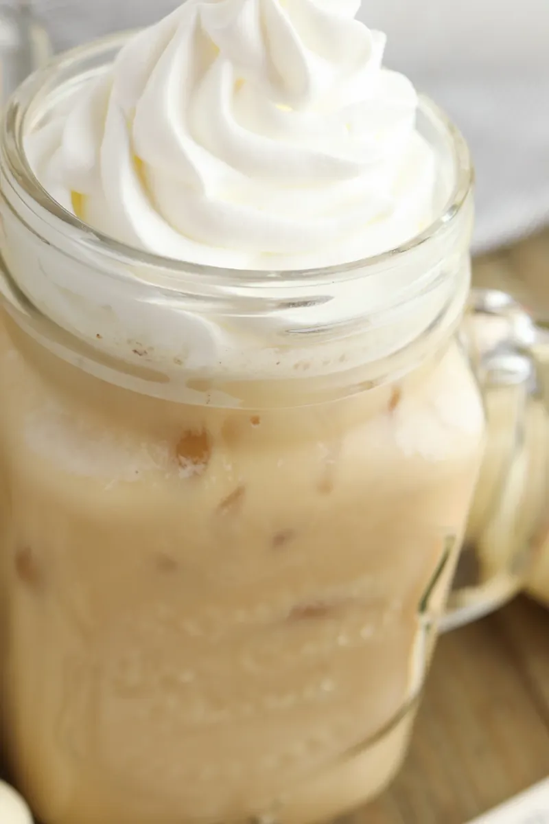 Pumpkin sweet cream cold brew showing swirled cream patterns