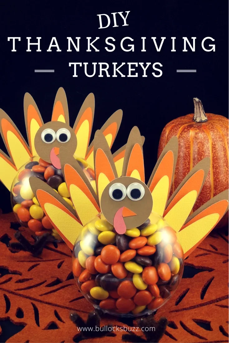 Clear plastic jars filled with autumn candies decorated with paper turkey feathers and faces