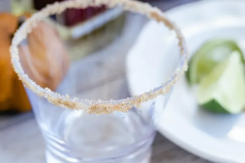 Glass with cinnamon brown sugar rim for thanksgiving margarita