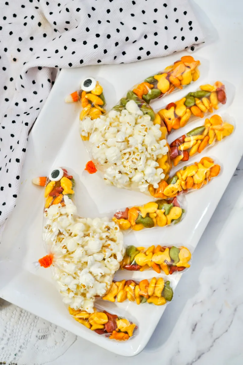 Turkey treat bags displayed on white tray ready for Thanksgiving celebration