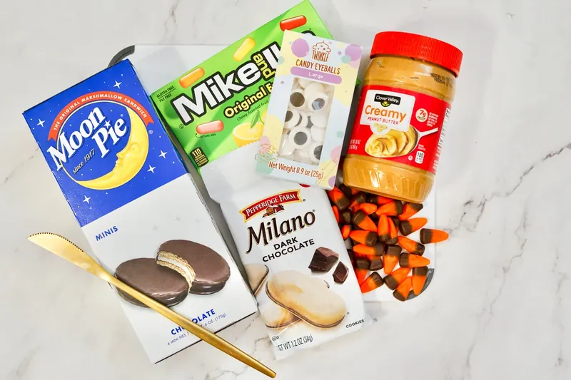 Turkey treat ingredients including Moon Pies, Milano cookies, candy corn, candy eyes, and peanut butter