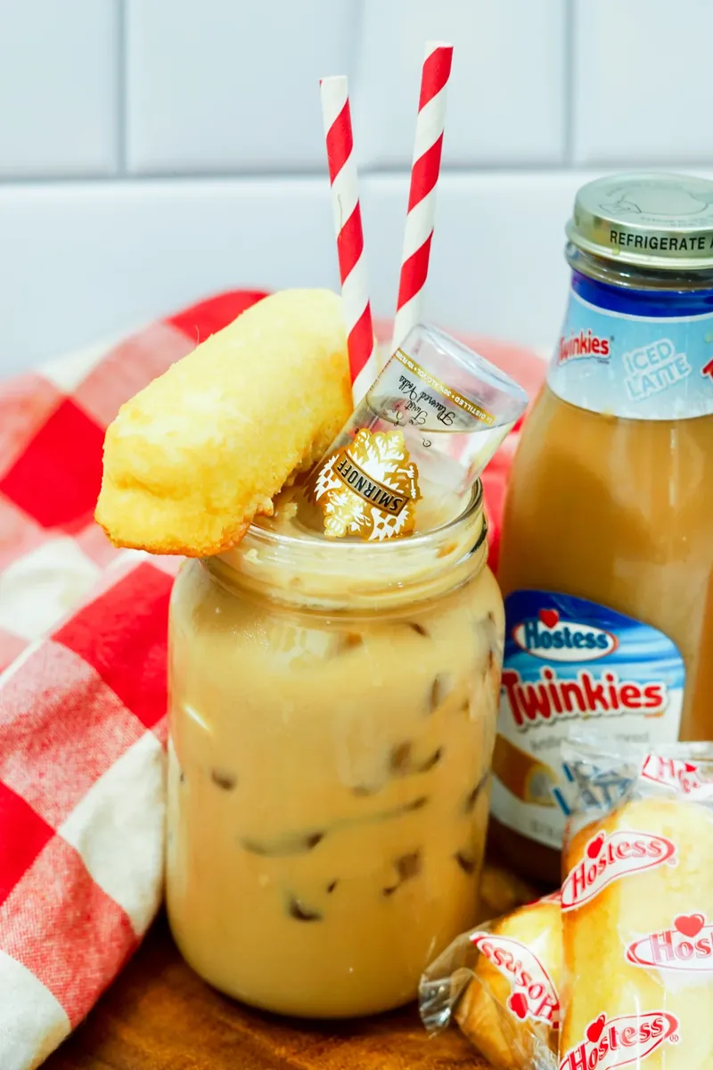 Beautiful final shot of Twinkie boozy iced latte with perfect Twinkie garnish
