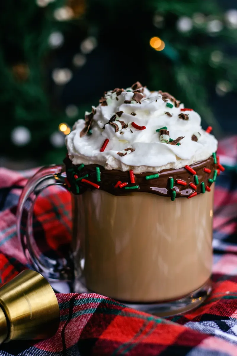 Finished boozy Christmas coffee in holiday table setting