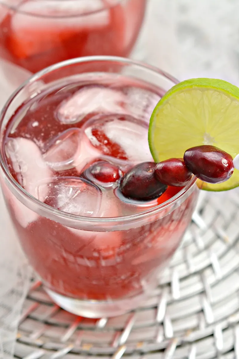 Close up of keto Christmas margarita showing the beautiful cranberry color