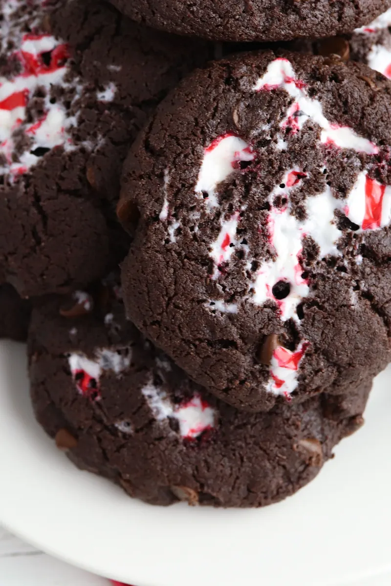 Close-up of peppermint chocolate cookies showing chewy texture and candy pieces