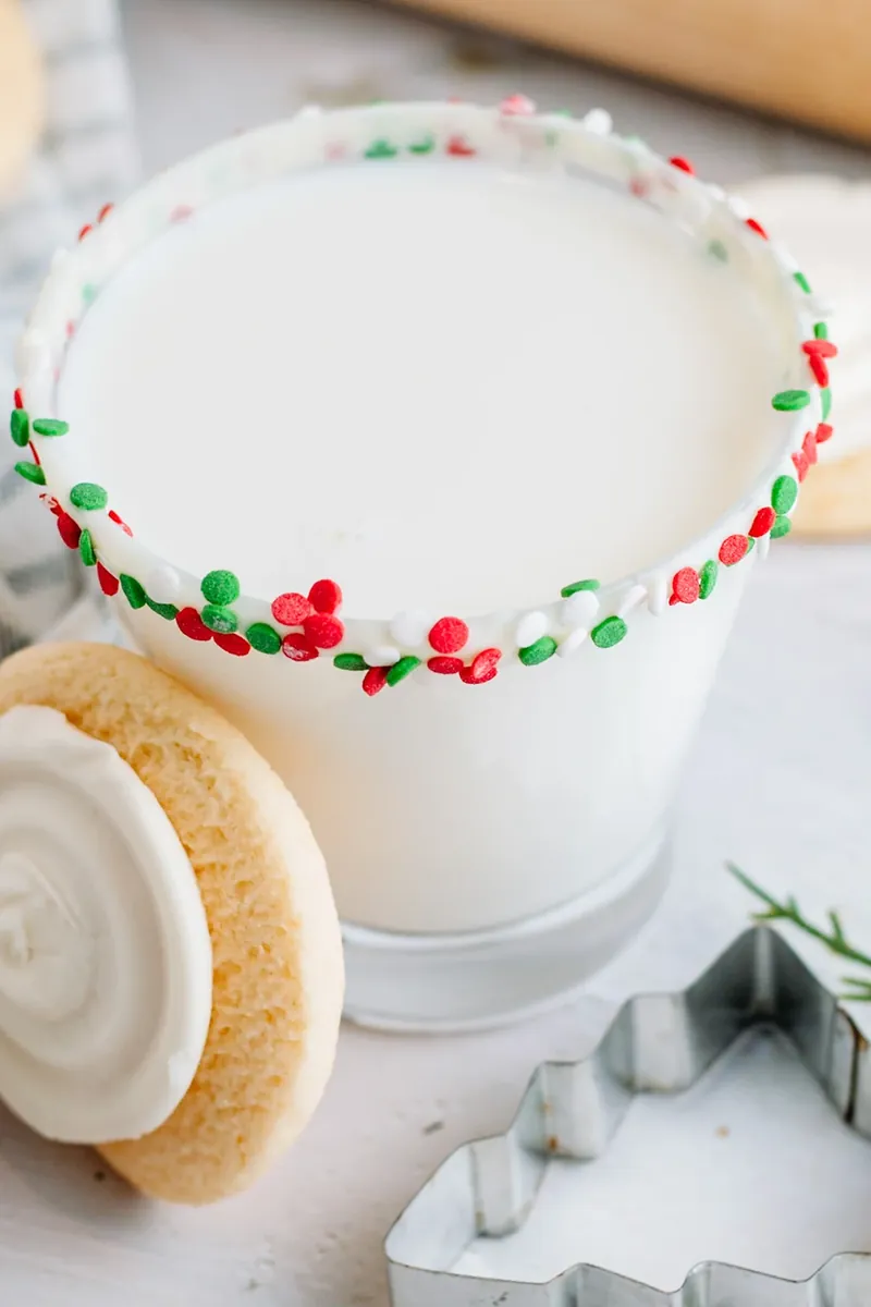 Close-up view of sugar cookie margarita showing detailed Christmas sprinkle rim
