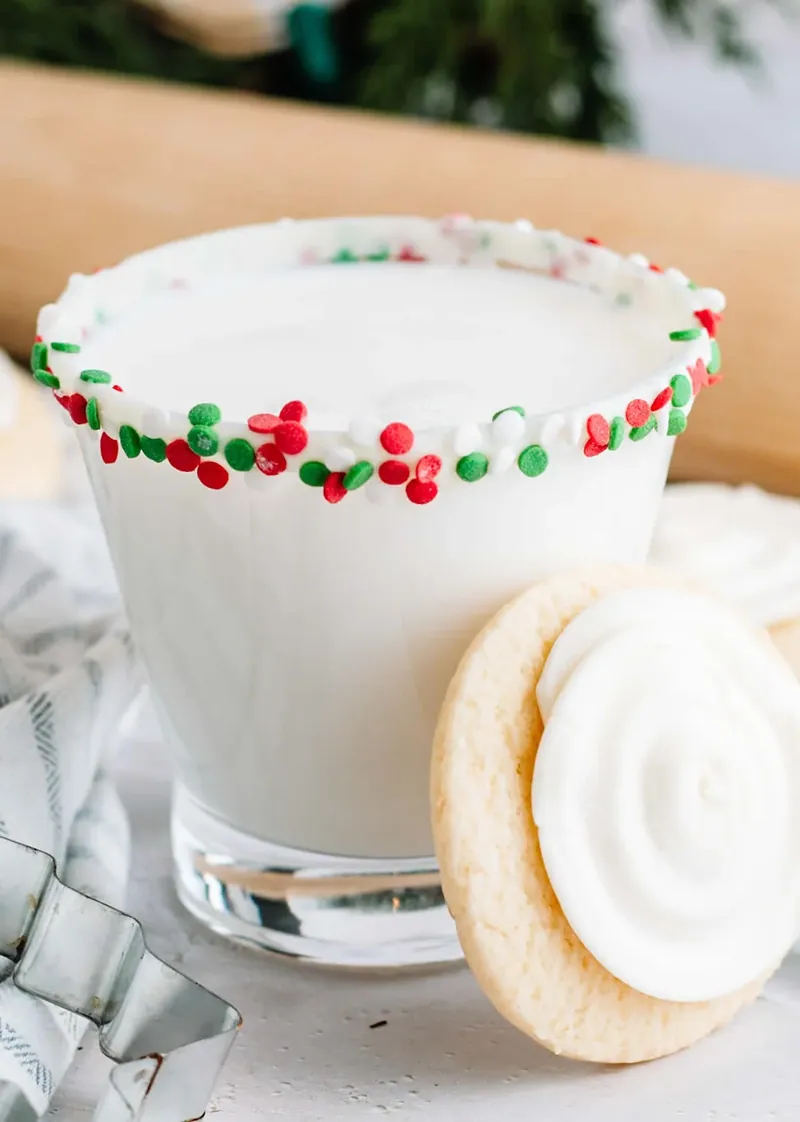 Sugar cookie margarita with white chocolate rim and red and green Christmas sprinkles