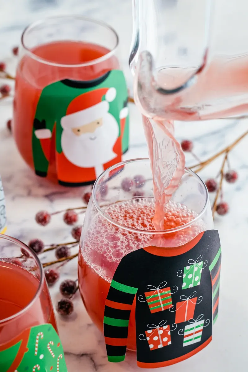 Ugly Christmas Sweater Margarita Punch in decorated glasses with festive sweater designs
