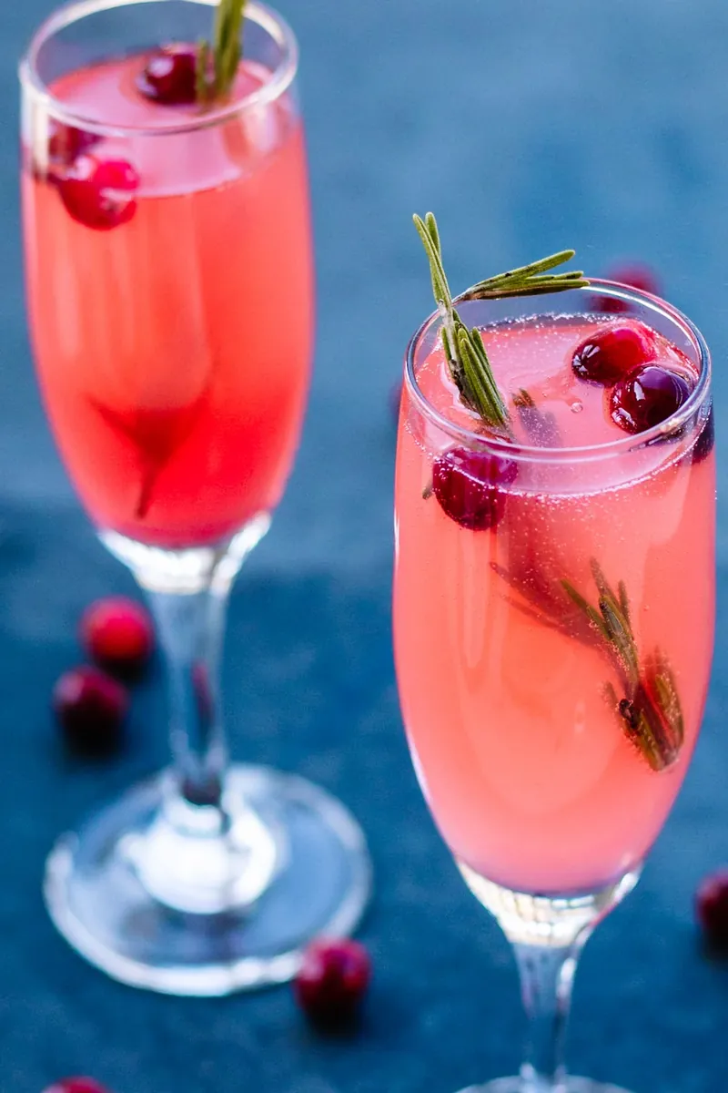 Two vanilla cranberry mimosas ready for celebration