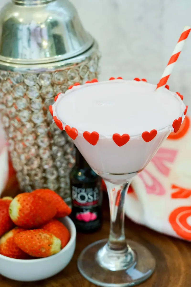 Close-up of Valentine's martini showing heart decorations on frosted rim